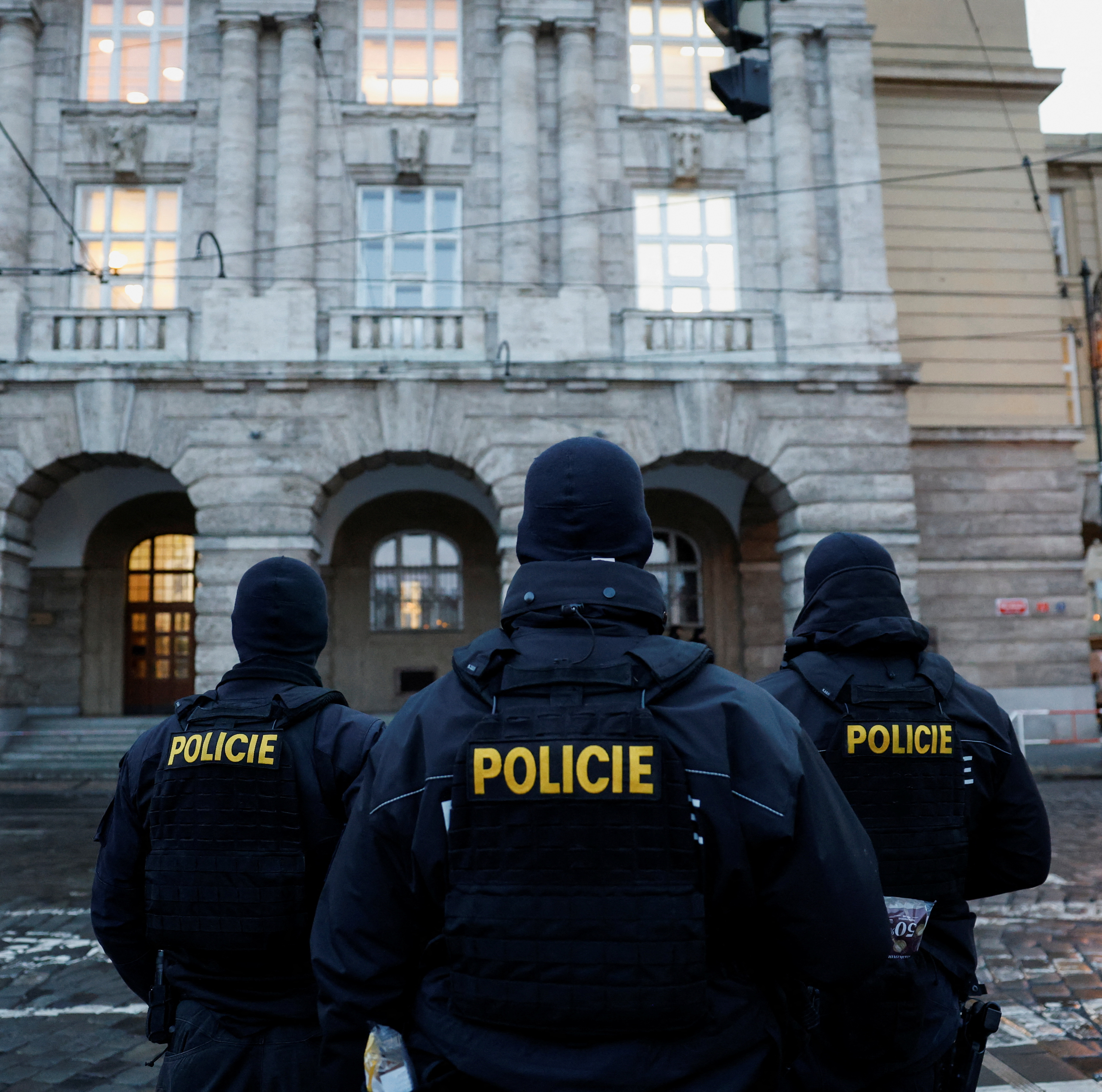 Members of the Police stand guard following a shooting at one of Charles University's buildings in Prague, Czech Republic, December 22, 2023. REUTERS/David W Cerny